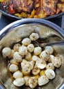 Mozzarella ÃÂheese balls in olive oil with Provencal herbs in the bowl